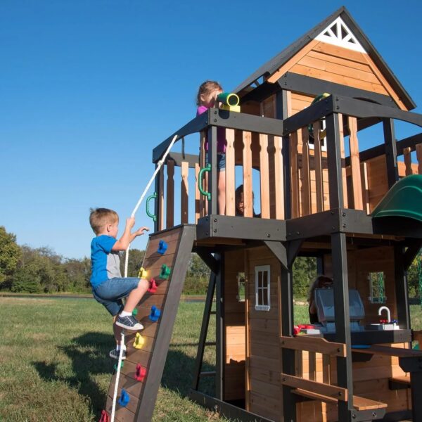 Backyard Discovery Canyon Creek Cedar Wood Swing Set with Wave Slide, Clubhouse, Play Kitchen, Picnic Area, Belt Swings, Web Swing, Rock Wall,...