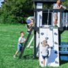 Backyard Discovery Canyon Creek Cedar Wood Swing Set with Wave Slide, Clubhouse, Play Kitchen, Picnic Area, Belt Swings, Web Swing, Rock Wall,...